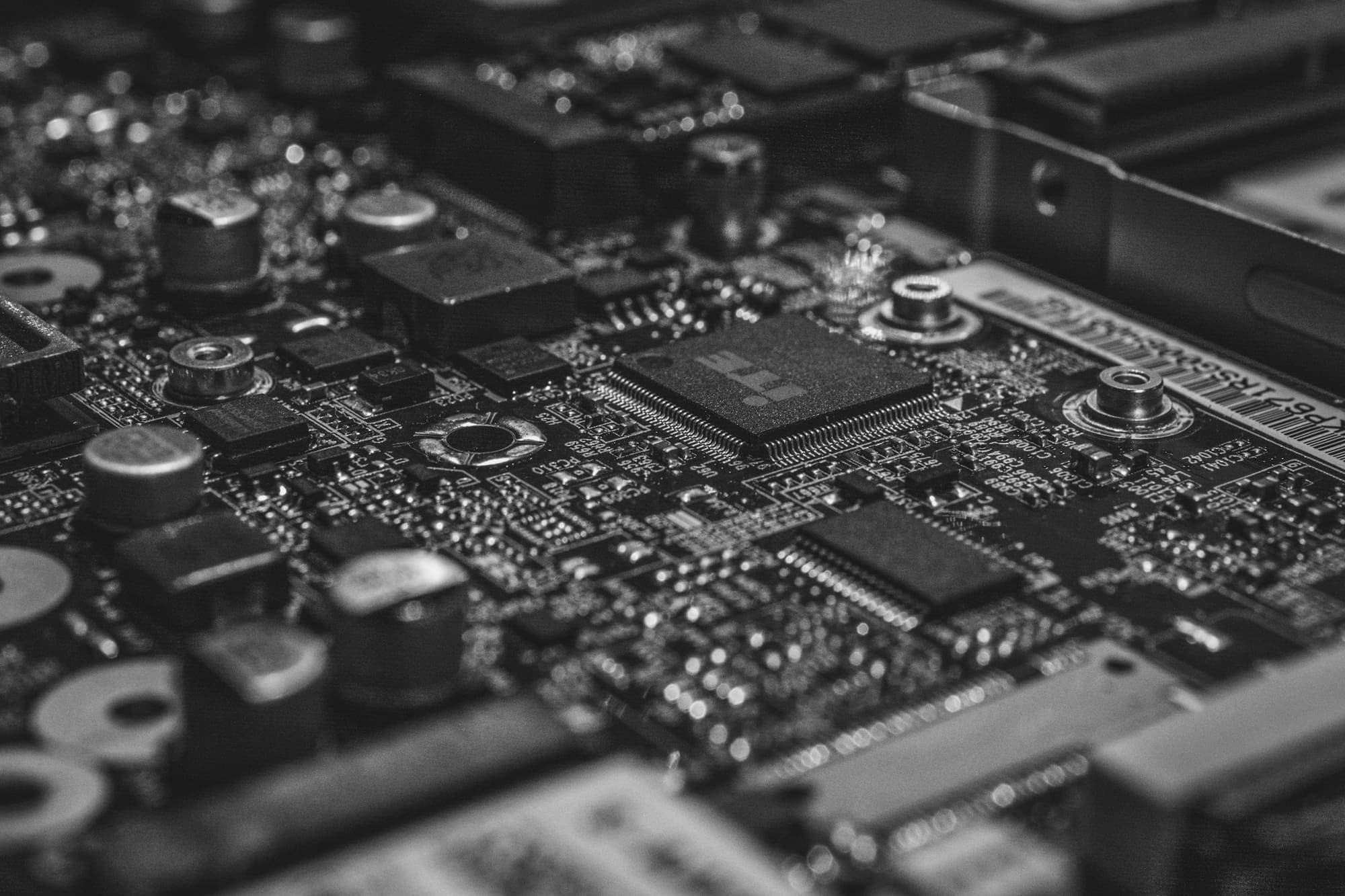Black-and-white macro photograph of a circuit board